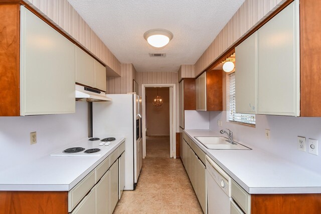 8218 Hazen St, Houston, TX 77036 - kitchen featuring a sink, under cabinet range hood, white appliances, a textured ceiling, and light countertops