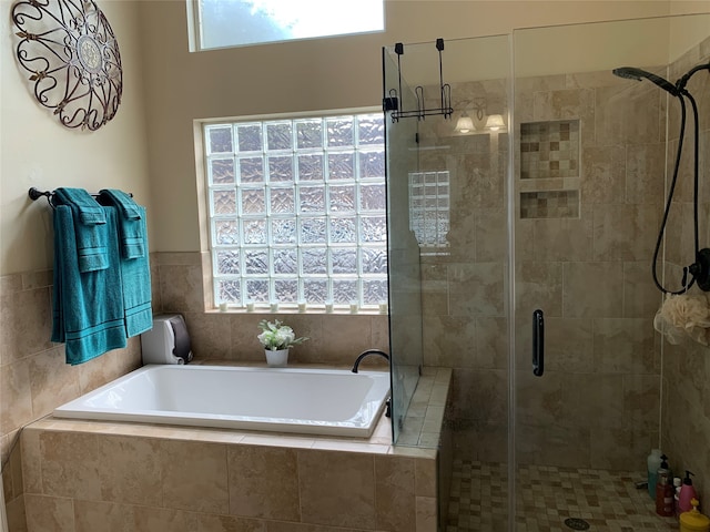 bathroom with independent shower and bath