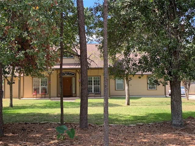 exterior space with a lawn