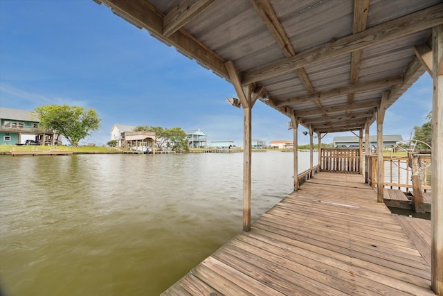 dock area with a water view