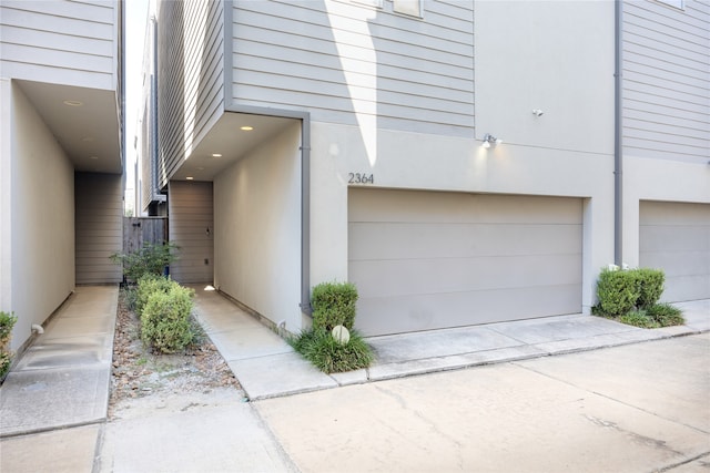 property entrance featuring a garage