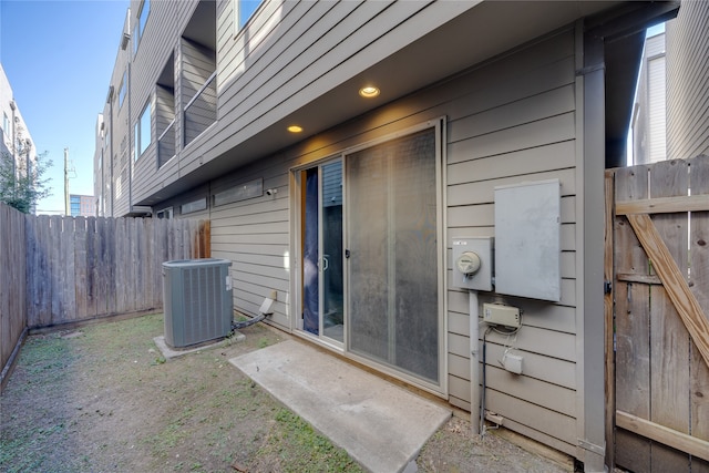 doorway to property featuring central AC