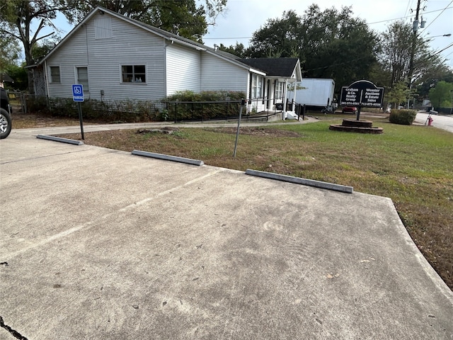 view of property exterior featuring a yard