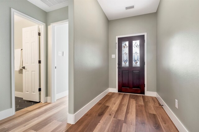 foyer with hardwood / wood-style floors