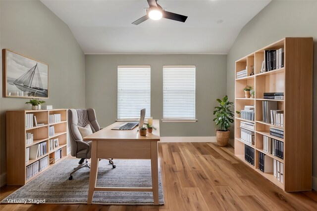 office with ceiling fan, lofted ceiling, and light wood-type flooring