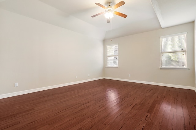 spare room with dark hardwood / wood-style floors and ceiling fan