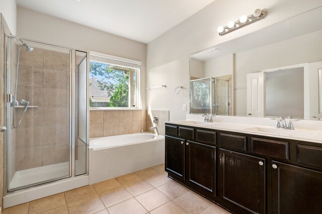 bathroom with vanity, separate shower and tub, and tile patterned flooring