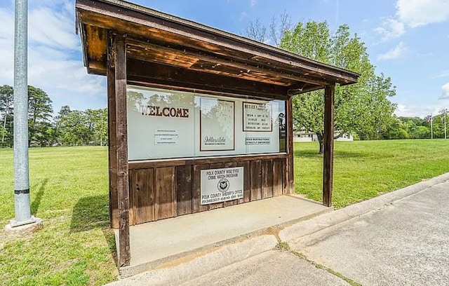 surrounding community featuring a yard