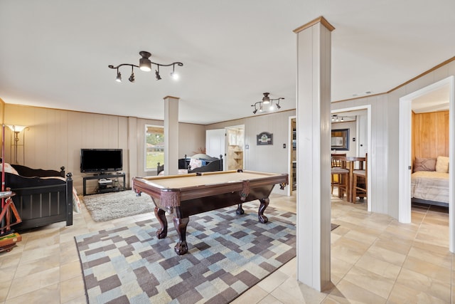 rec room featuring crown molding, wooden walls, billiards, and decorative columns