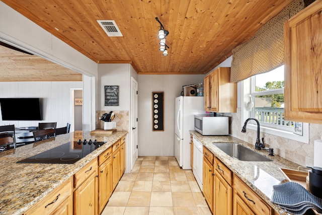 kitchen featuring wood ceiling, decorative backsplash, light stone countertops, sink, and white appliances