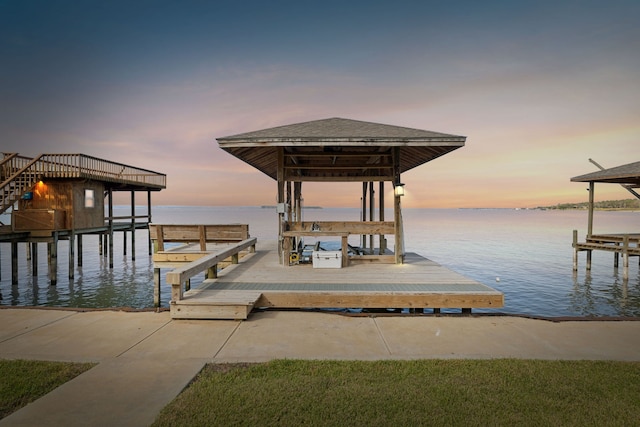 dock area with a water view