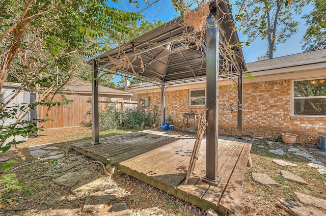 view of patio / terrace with a gazebo and a deck