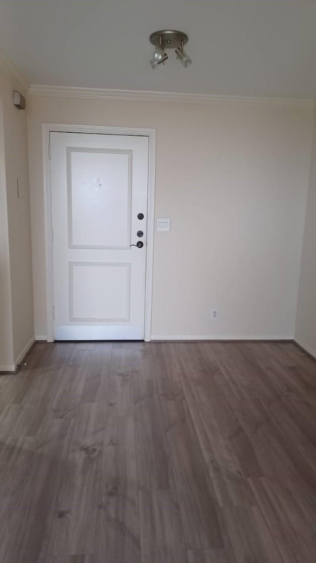 3525 Sage Rd Unit 1202, Houston, TX 77056 - foyer entrance with ornamental molding and dark wood-style floors
