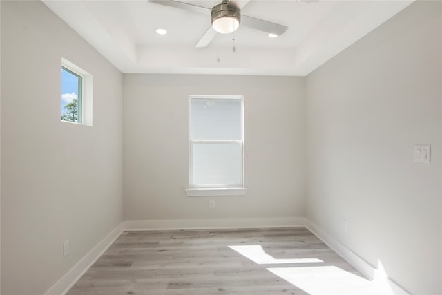 empty room featuring light hardwood / wood-style floors and ceiling fan