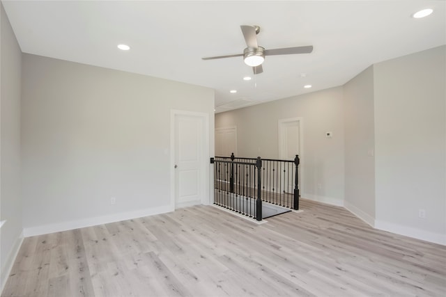 spare room featuring light hardwood / wood-style floors