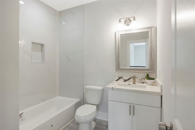 full bathroom featuring vanity, toilet, and tiled shower / bath