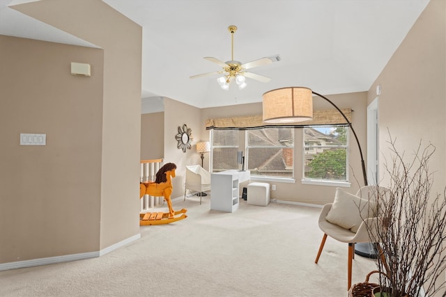 sitting room with carpet floors and ceiling fan