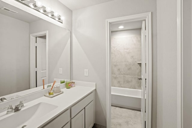 3522 Lake Lugano Cir, Katy, TX 77493 - bathroom featuring vanity and tub / shower combination