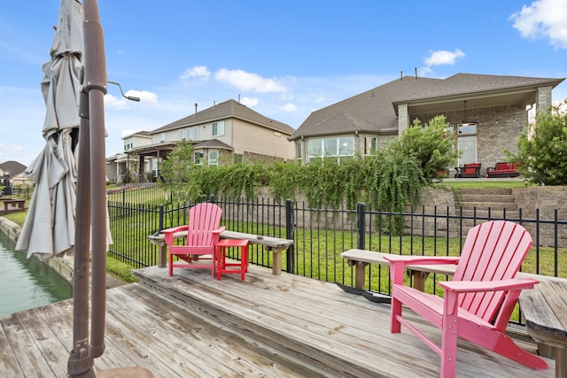 wooden deck with a yard