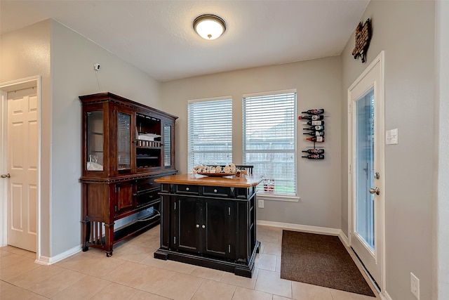 office area with light tile patterned flooring