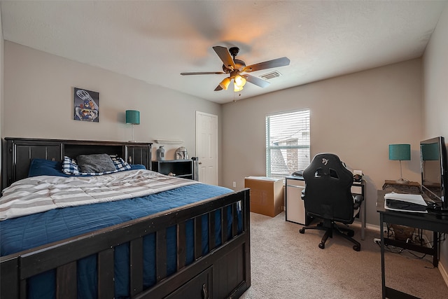 bedroom with light colored carpet and ceiling fan