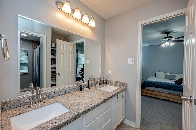 bathroom featuring vanity and ceiling fan