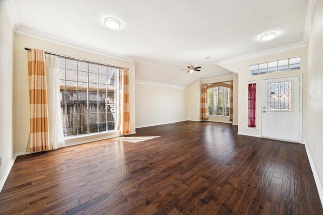 entryway with ceiling fan, crown molding, vaulted ceiling, and dark hardwood / wood-style floors