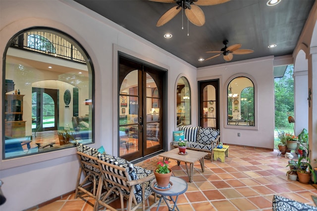 view of patio featuring french doors and ceiling fan