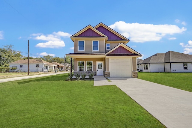 craftsman house featuring covered porch, a front yard, and a garage