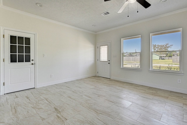 unfurnished room featuring ceiling fan, crown molding, and a textured ceiling