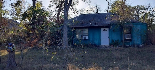 view of front of property with cooling unit