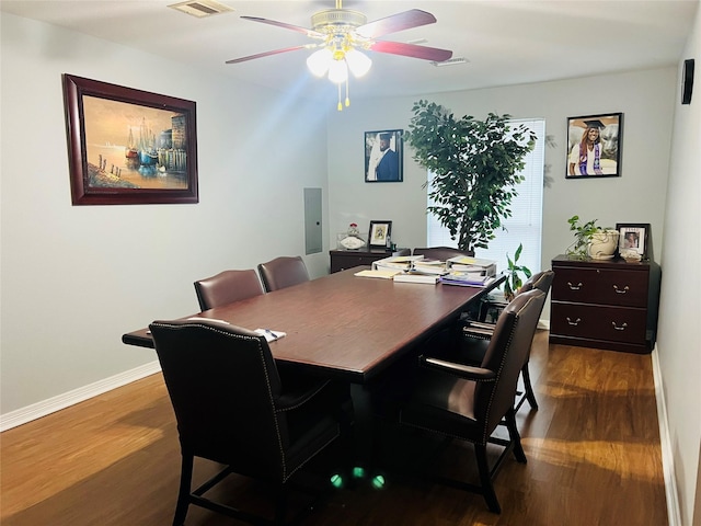 dining area with ceiling fan and dark hardwood / wood-style flooring