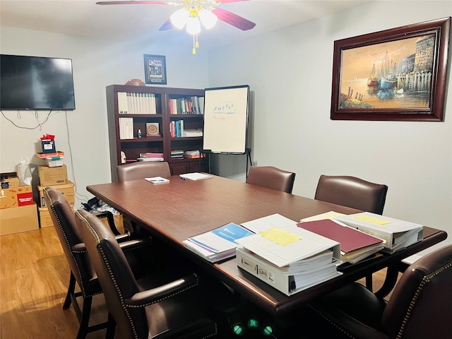 office space featuring light wood-type flooring and ceiling fan