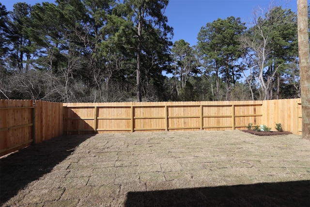 view of yard featuring a fenced backyard