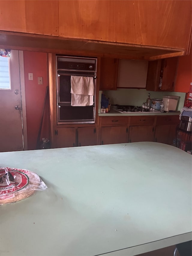 kitchen featuring black oven