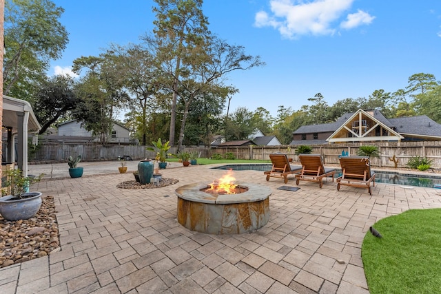 view of patio featuring a fire pit