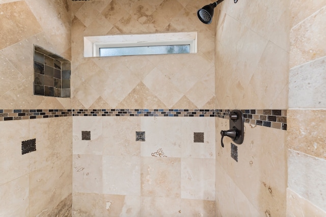 room details featuring tiled shower