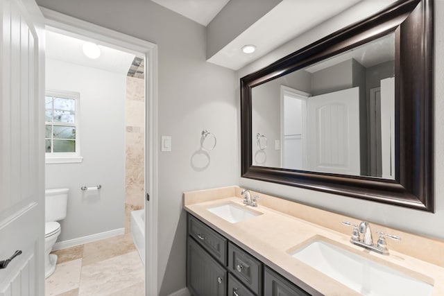 full bathroom with vanity, toilet, and tub / shower combination