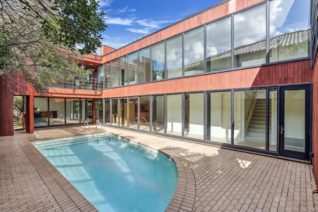 view of pool with a patio