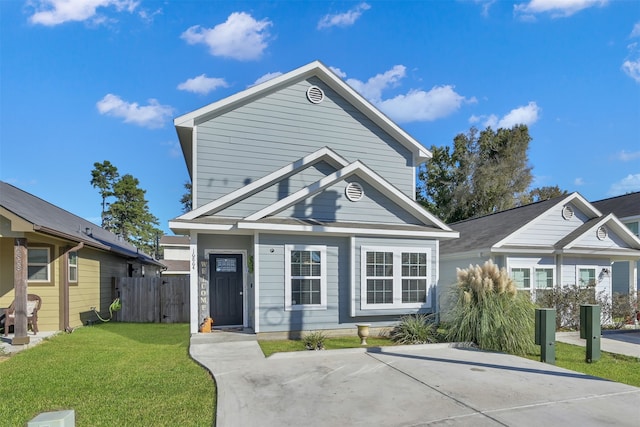 view of front of home with a front lawn