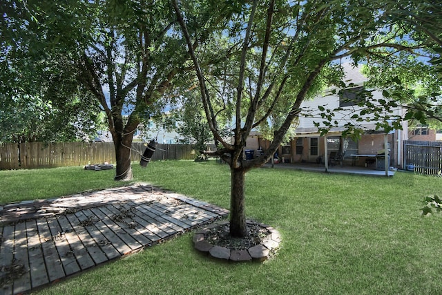 view of yard with a wooden deck