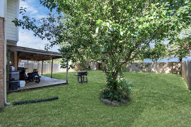 view of yard with a deck