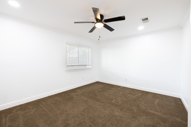 unfurnished room featuring crown molding, dark colored carpet, and ceiling fan