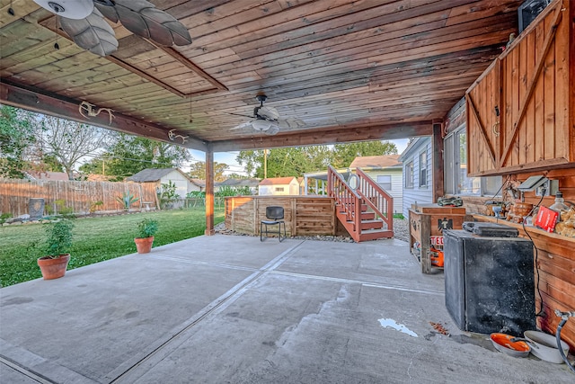 view of patio featuring ceiling fan