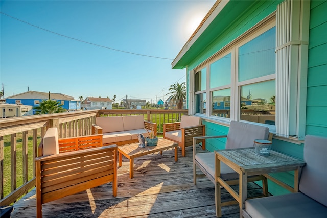 deck featuring outdoor lounge area