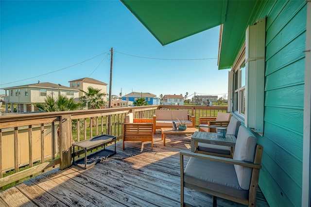 deck featuring outdoor lounge area