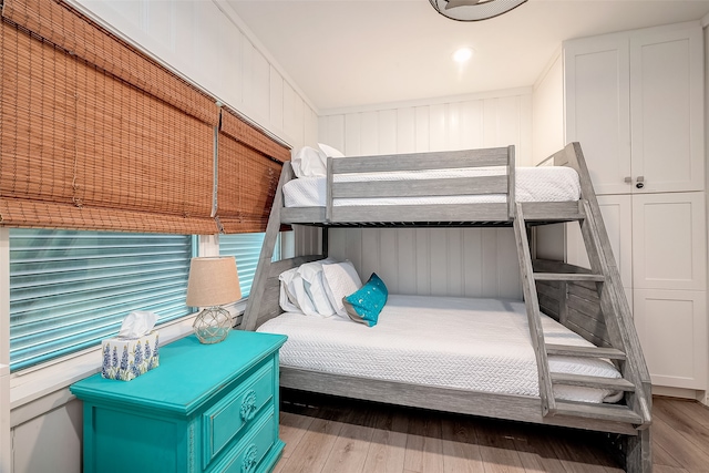 bedroom featuring wood-type flooring