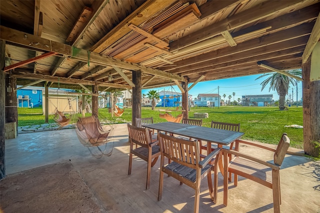 view of patio / terrace with a shed