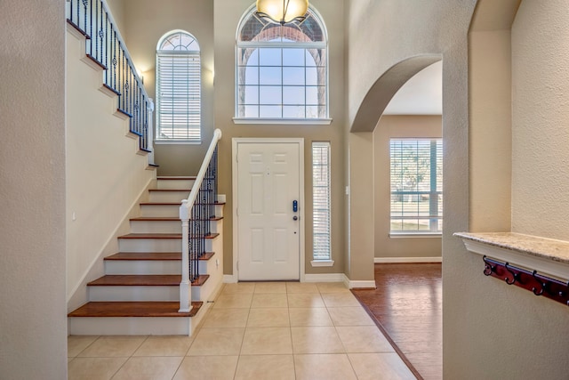 foyer entrance with light hardwood / wood-style floors