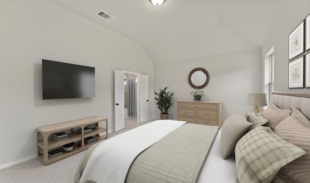 bedroom featuring lofted ceiling, carpet floors, and ensuite bath